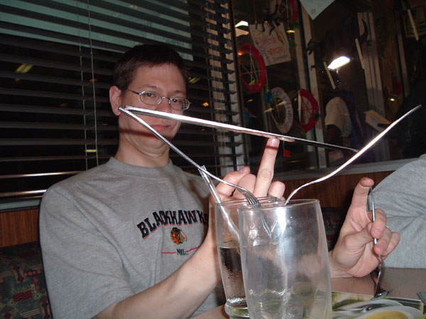 dennys_weirdfingertriangle